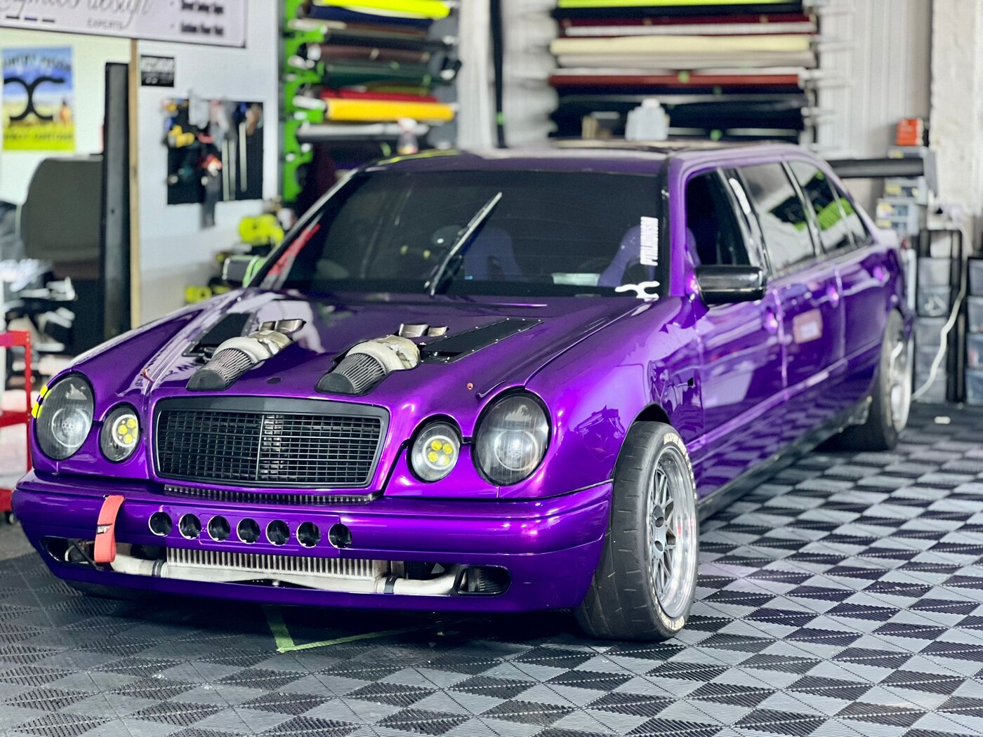 The drift limo in the Wizz's Wraps workshop showing the full purple base colour