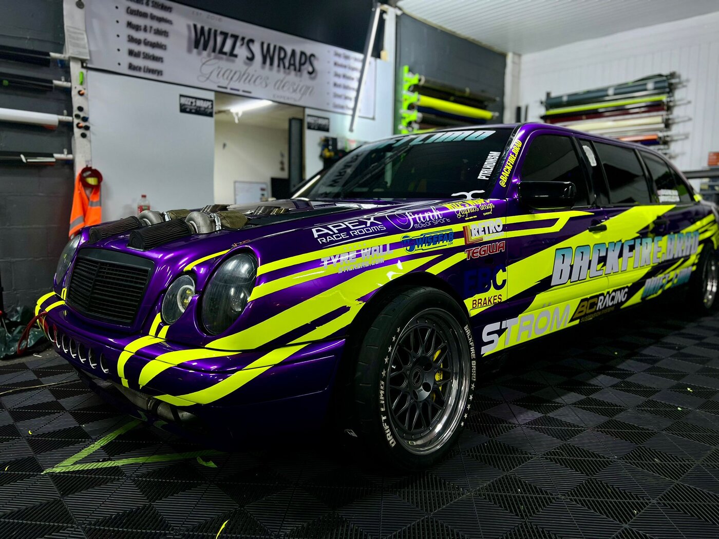 The completed drift limo with full custom livery in the Wizz's Wraps workshop